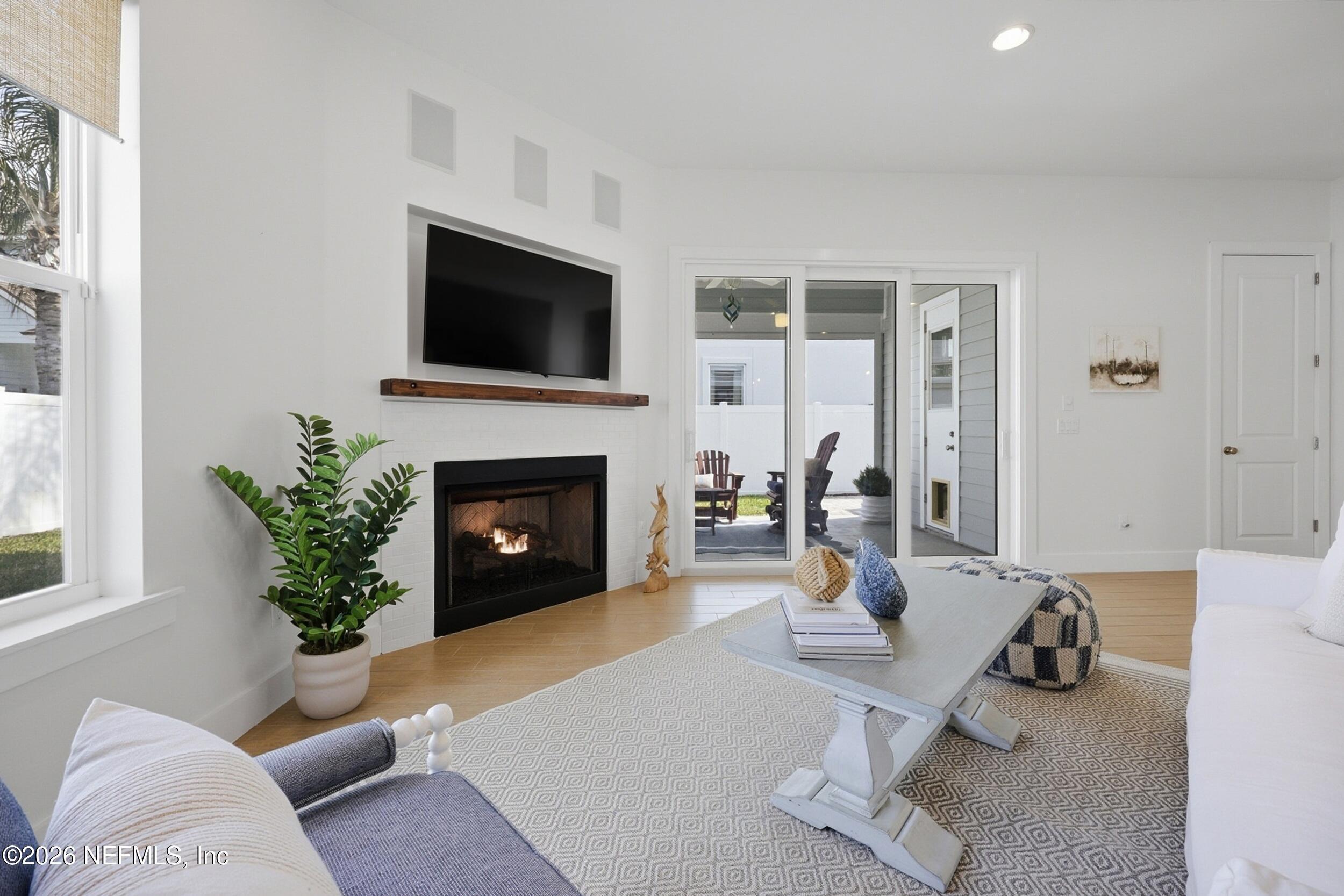 Image 4: Living Room with Fireplace