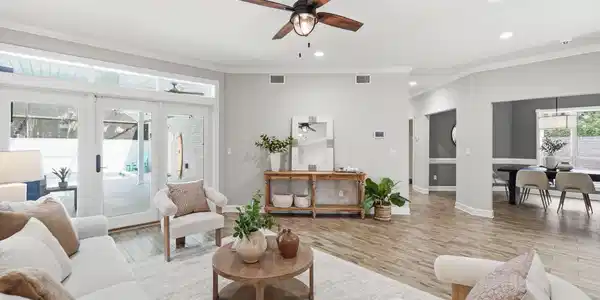 Image 3: Living Room overlooking the pool