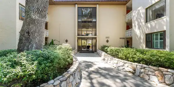 Image 2: Exterior Front of the Condo Complex