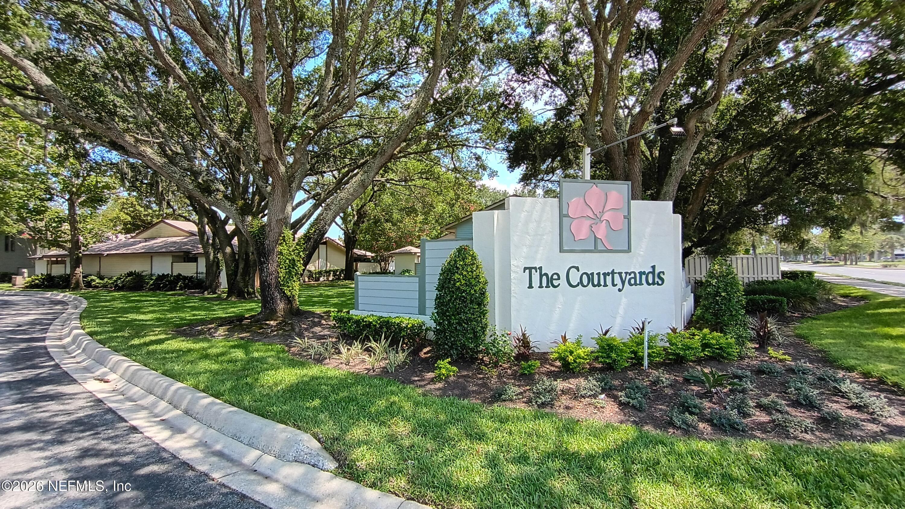 Image 1: courageous condo exterior one