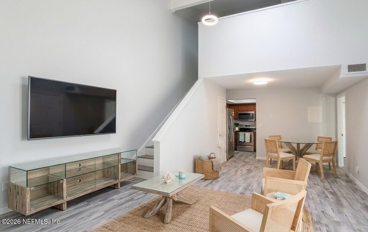 Image 3: courageous condo staged family room