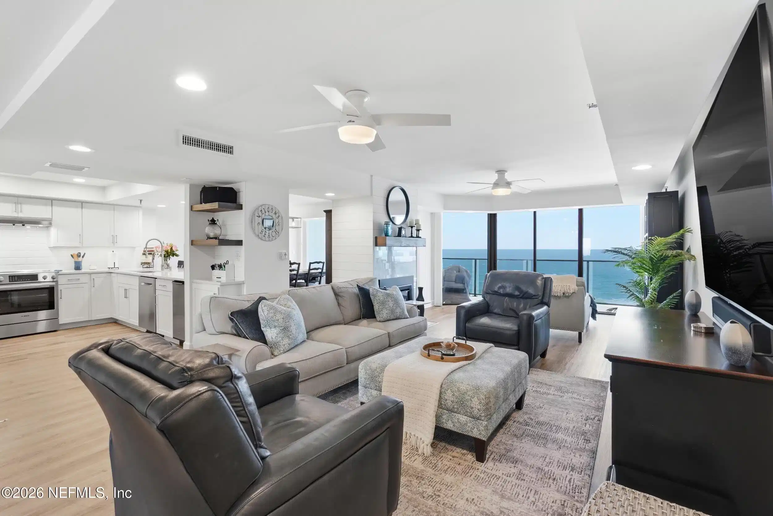 Image 1: living room ocean views