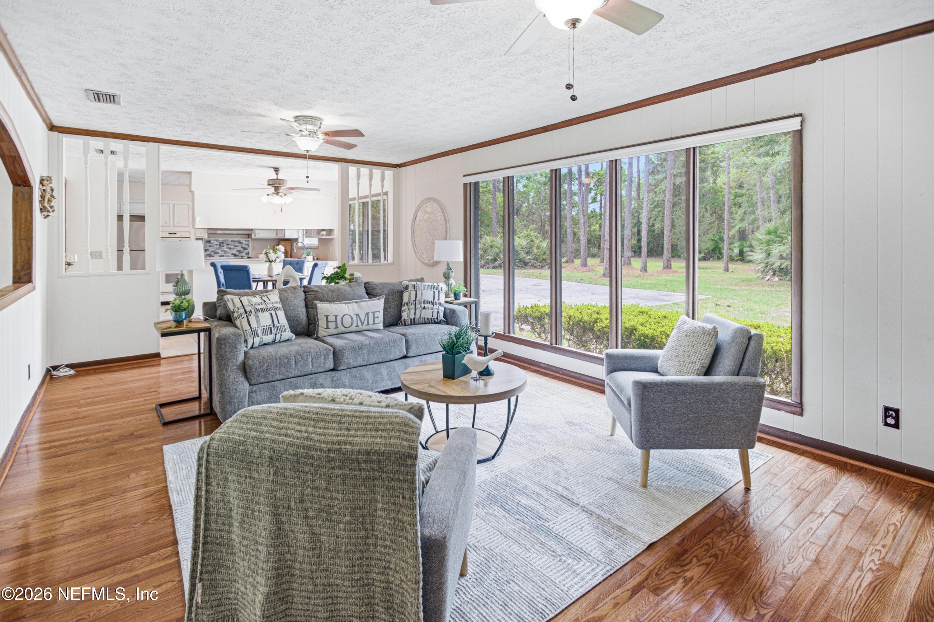 Image 3: Family Room with Large Windows