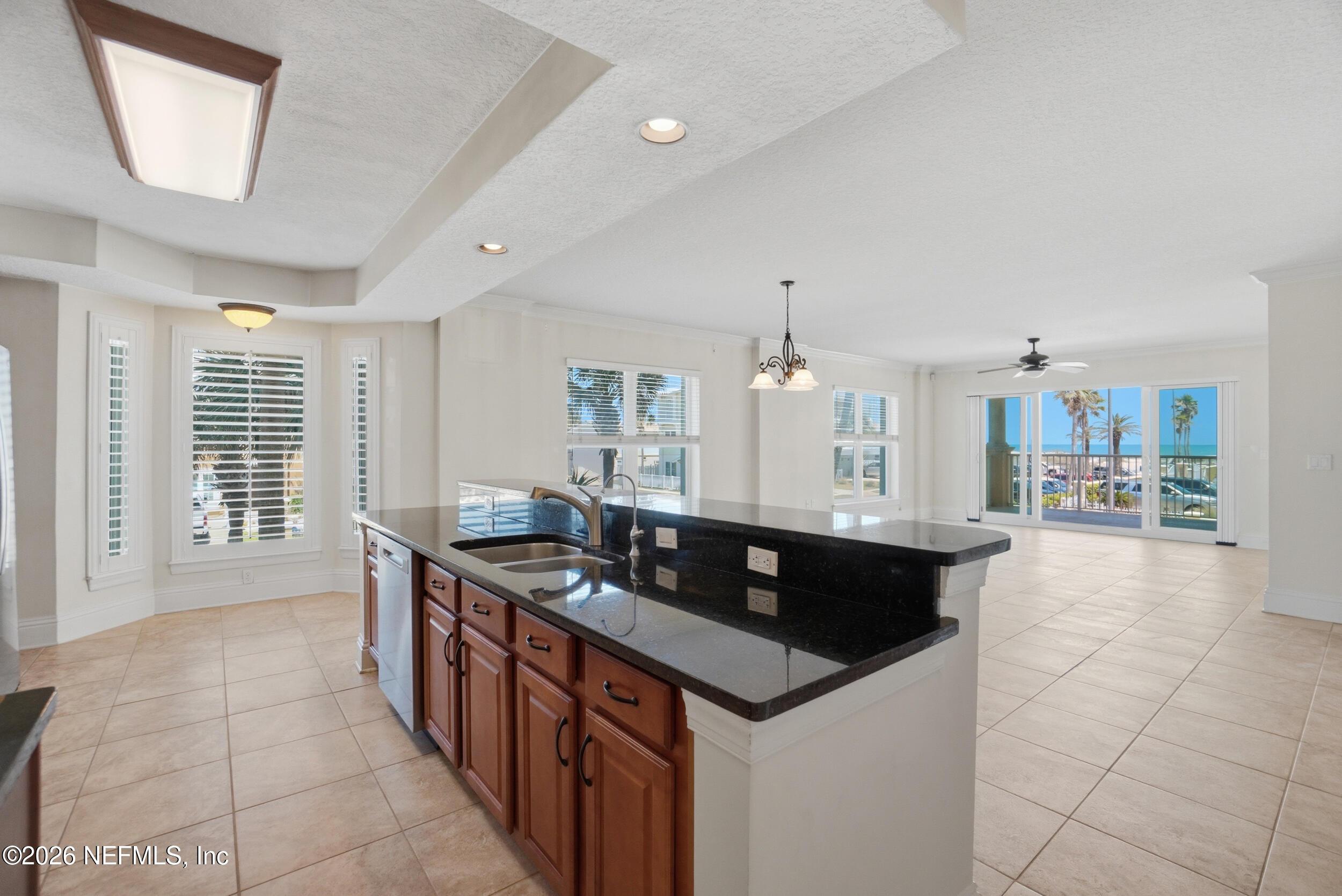 Image 2: open concept living ocean views