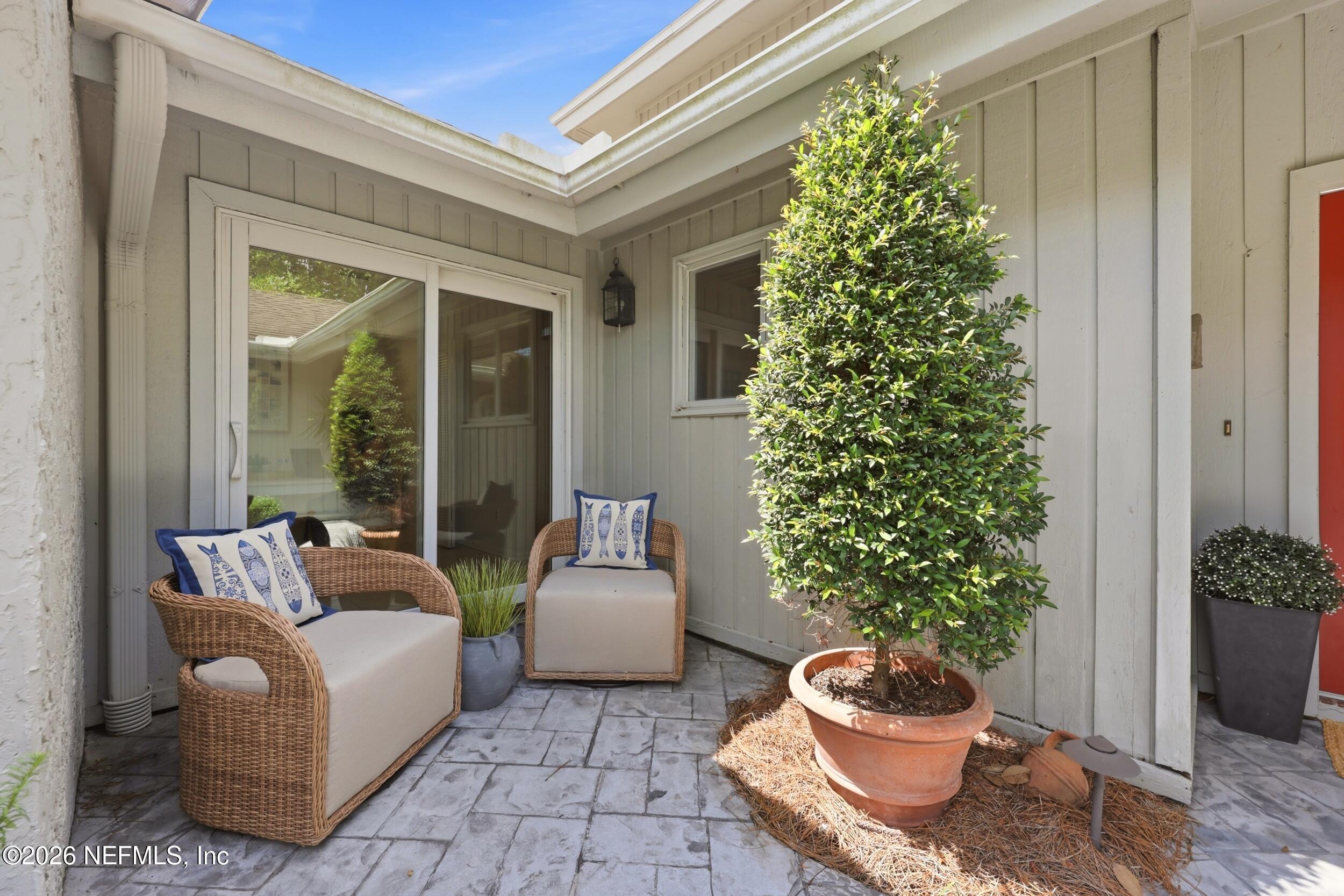 Image 3: Courtyard Sitting Area