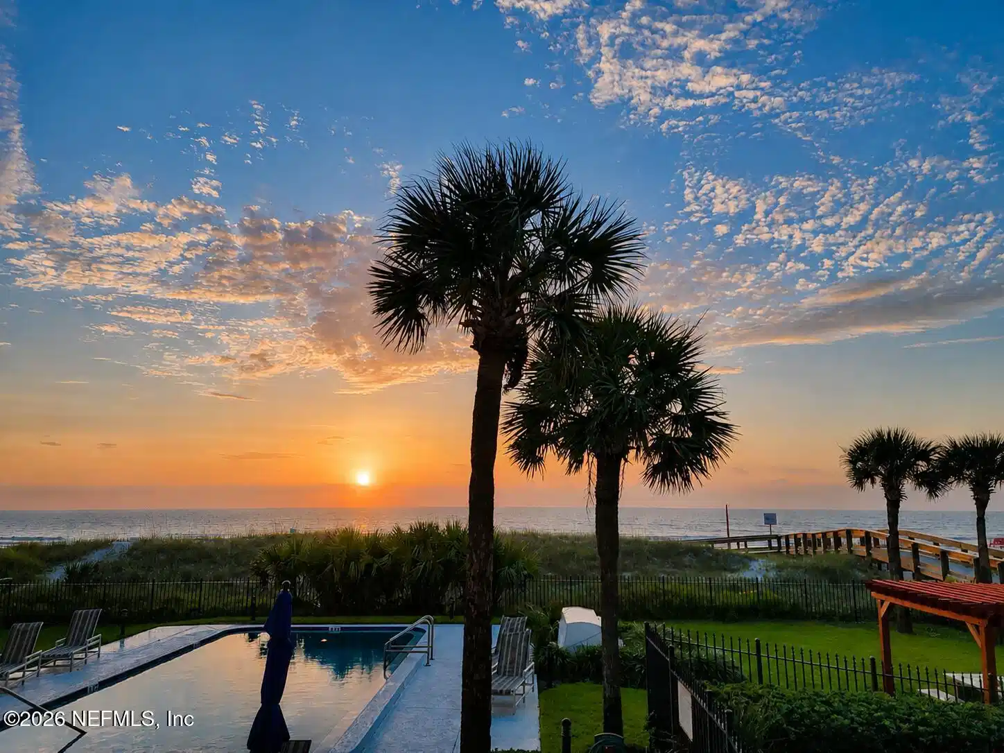 Image 1: Sunrise Balcony View