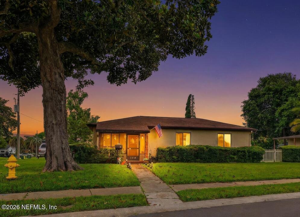 Image 1: a-twilight-front-house