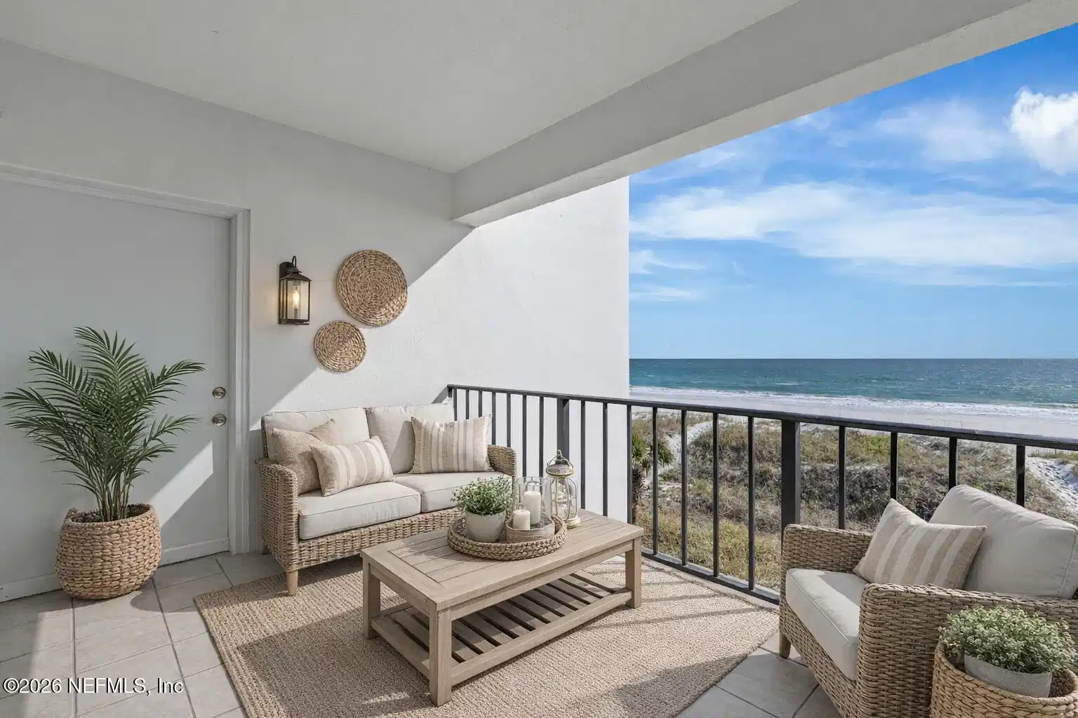 Image 1: Coastal balcony with ocean view