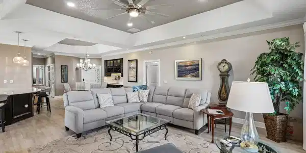Image 4: Living Area to Dining and Foyer