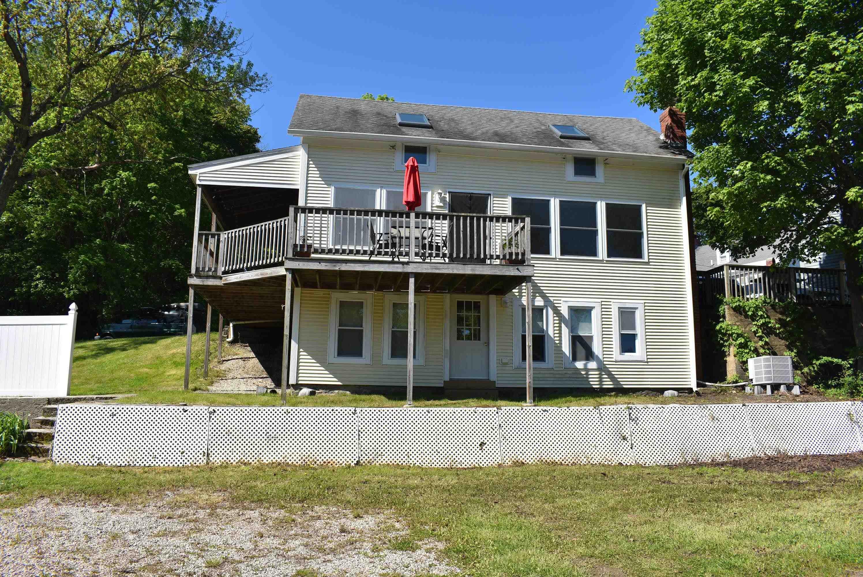 Image 1: Back of house facing the Lamprey River