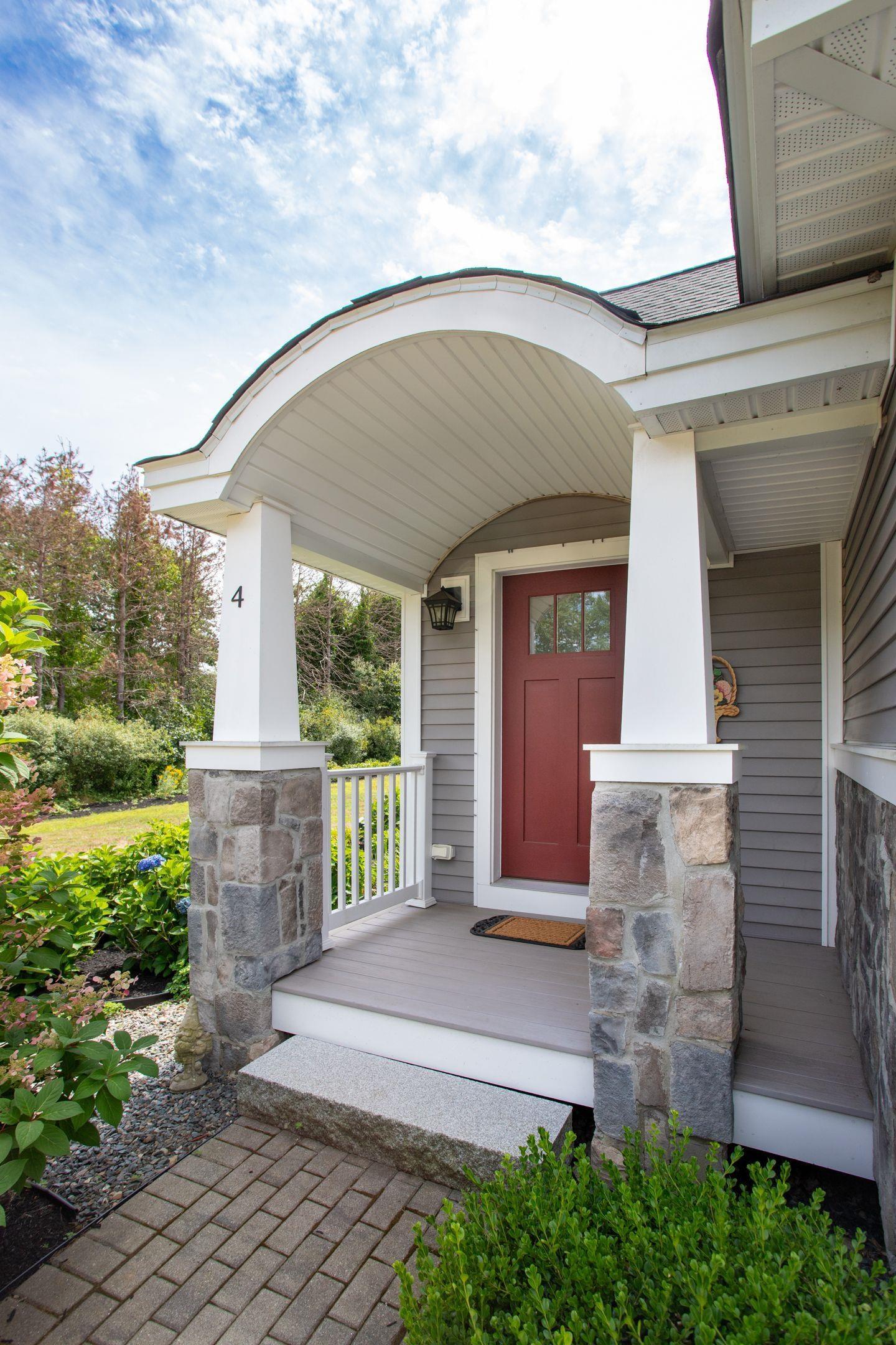 Image 3: Terrific front entry with stone accent