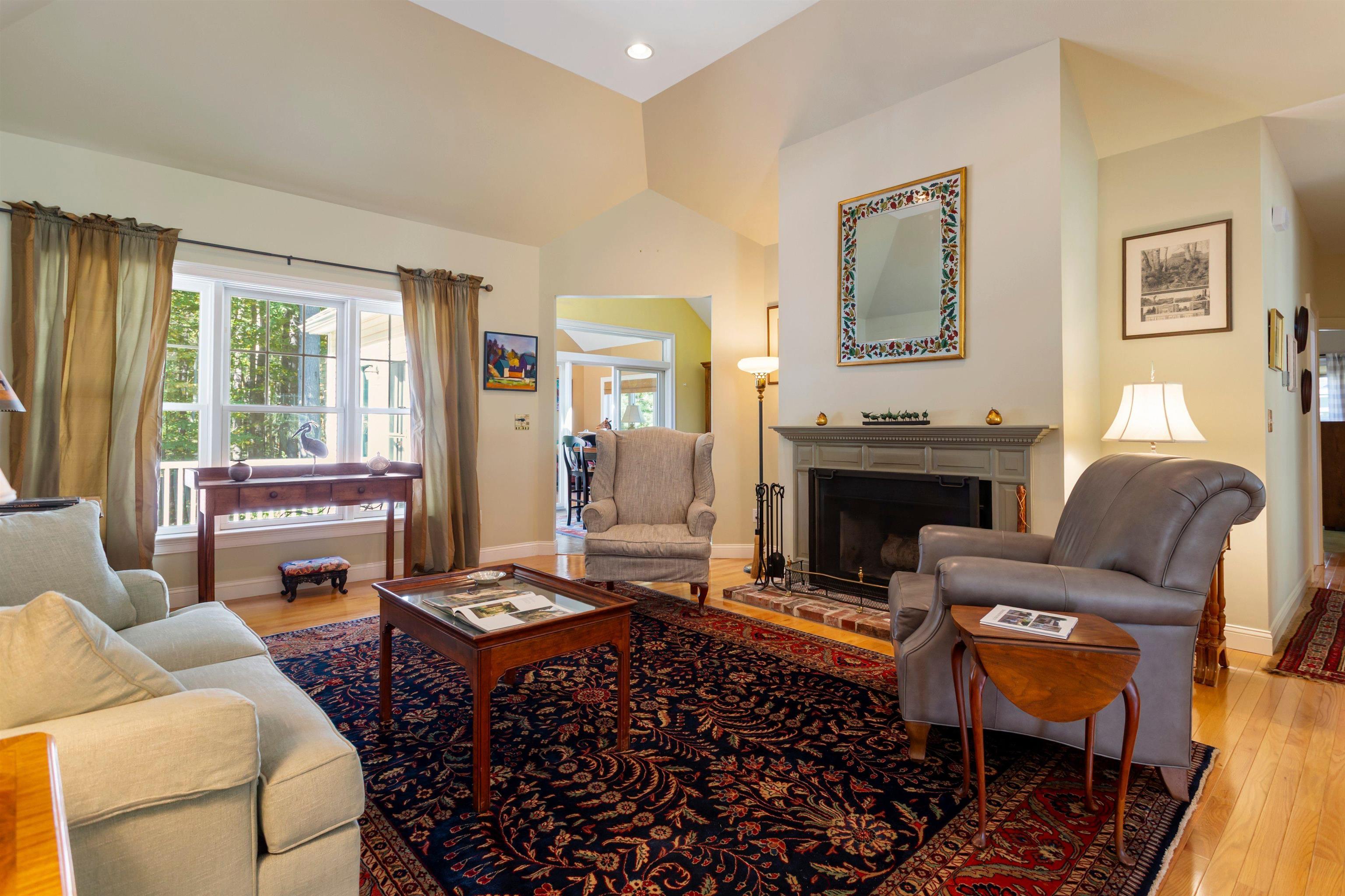 Image 3: Featuring a wood fireplace