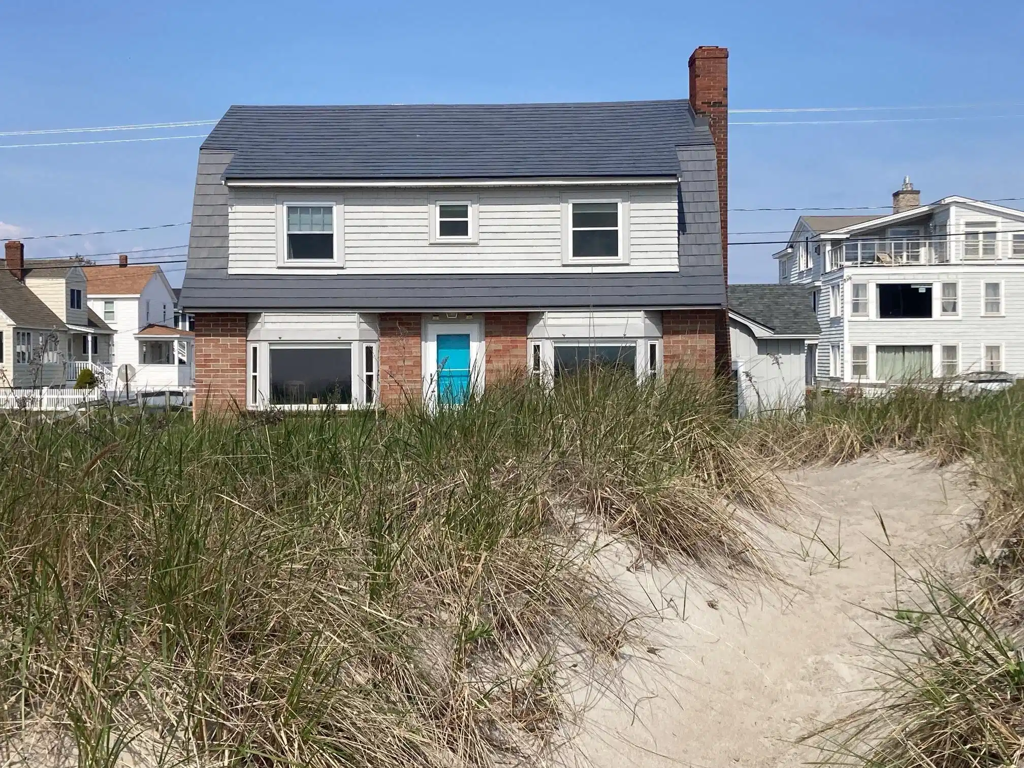 Image 1: Nestled by the dune Image 1: Nestled by the dune