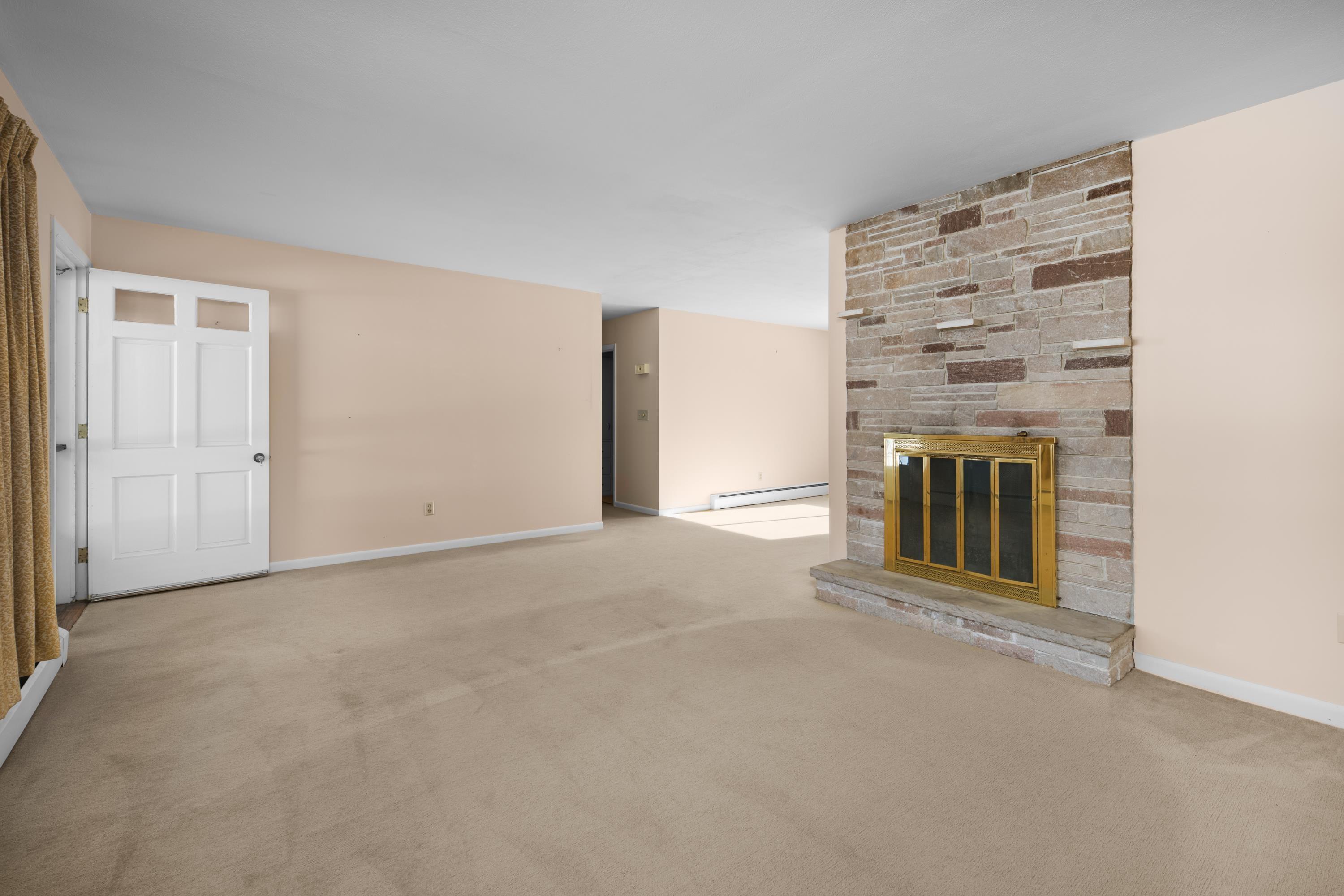 Image 4: Living Room area w/Fireplace