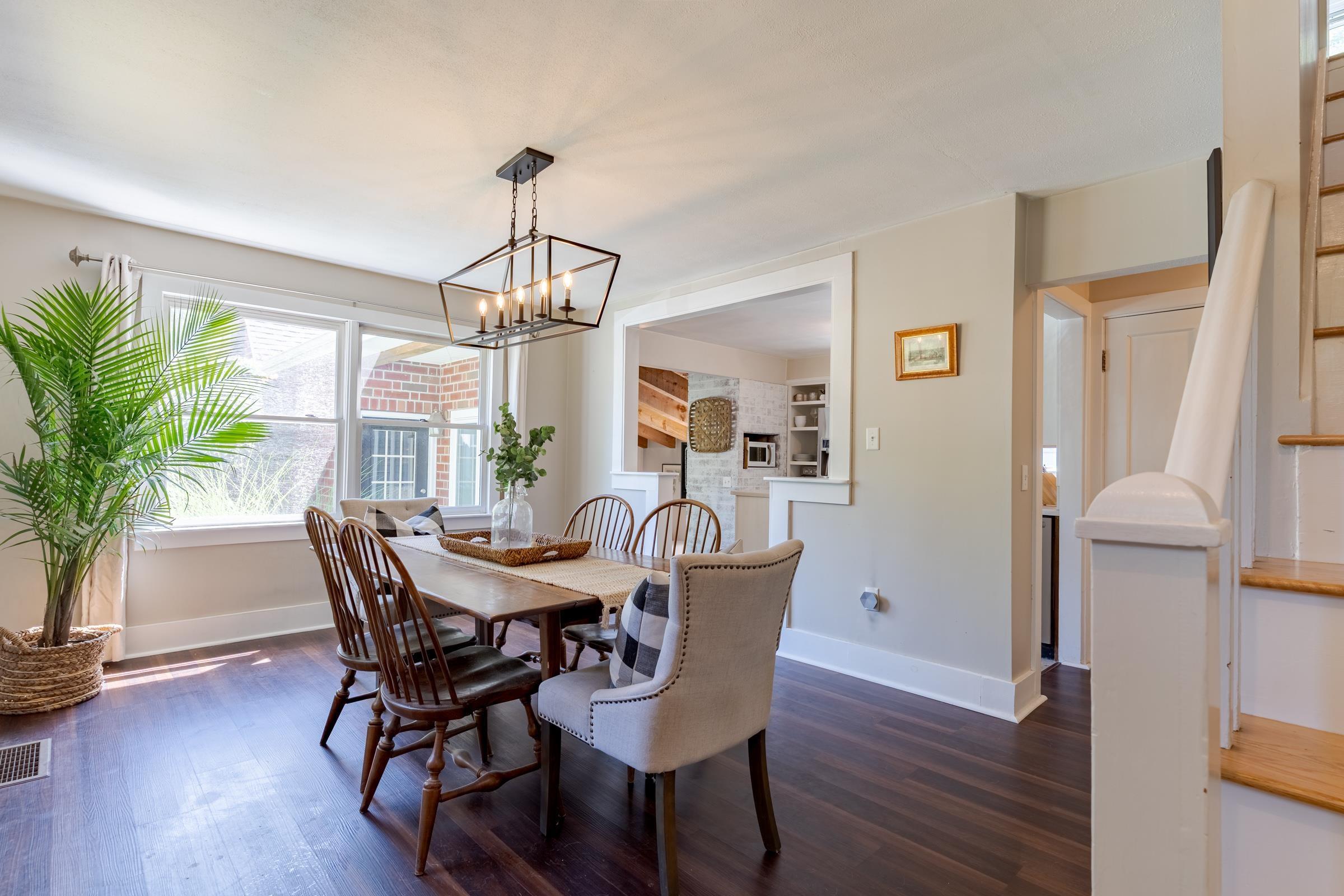 Image 1: View from Front Door Entryway into Dining Room