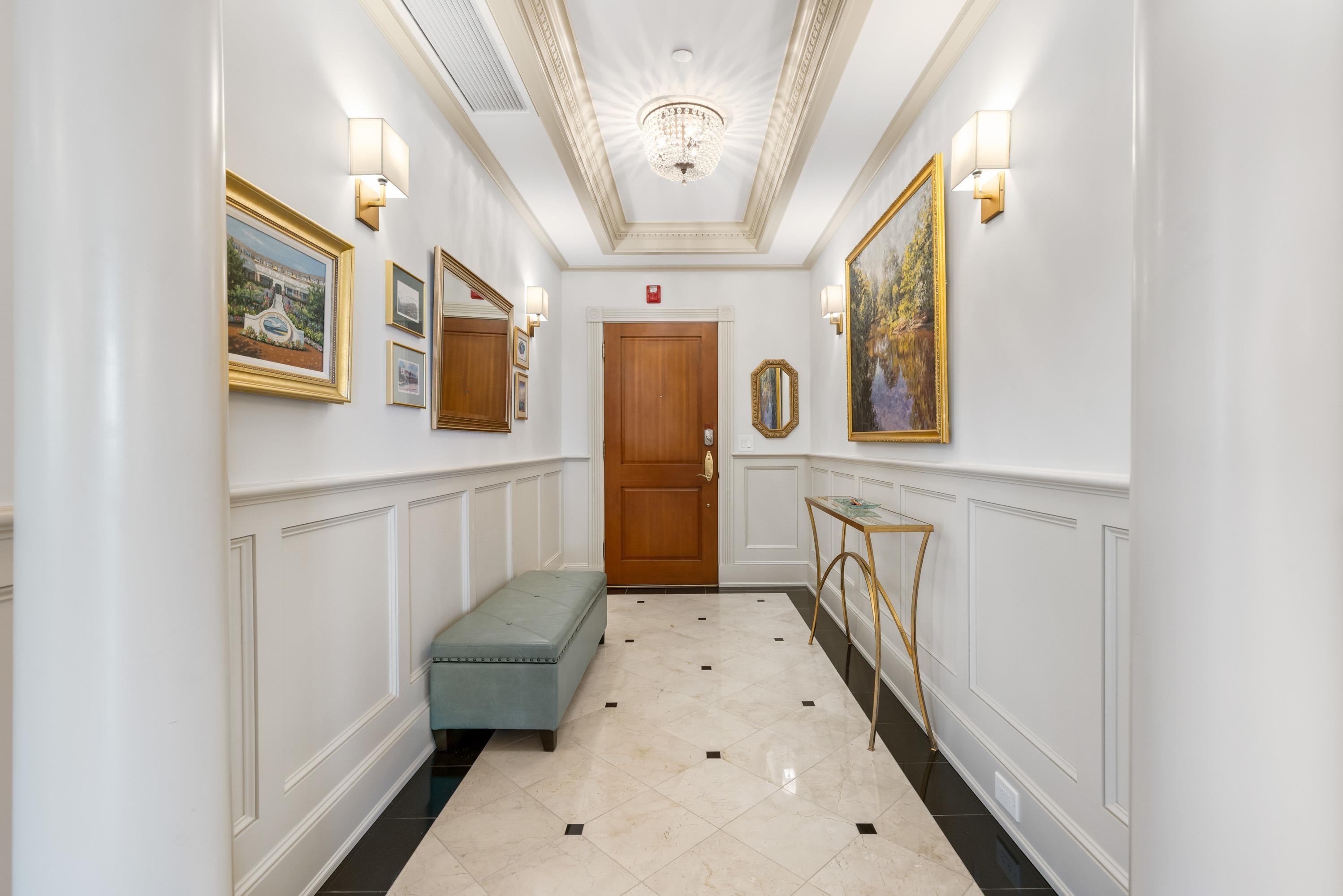 Image 3: Grand Entryway with Marble Tile