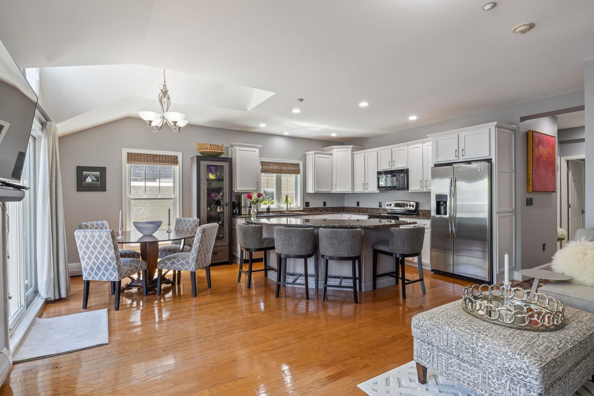 Image 4: Open Concept Kitchen, Dining & Living Area