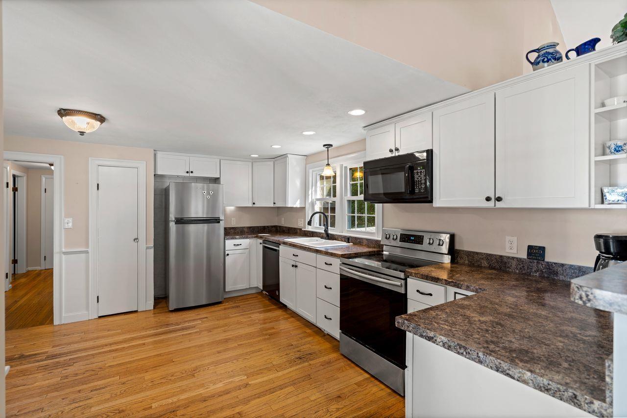 Image 3: Kitchen has Plenty of Counter Space/Cabinets