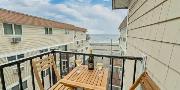 Image 3: Enjoy cocktails or coffee on the balcony while watching the Image 3: Enjoy cocktails or coffee on the balcony while watching the