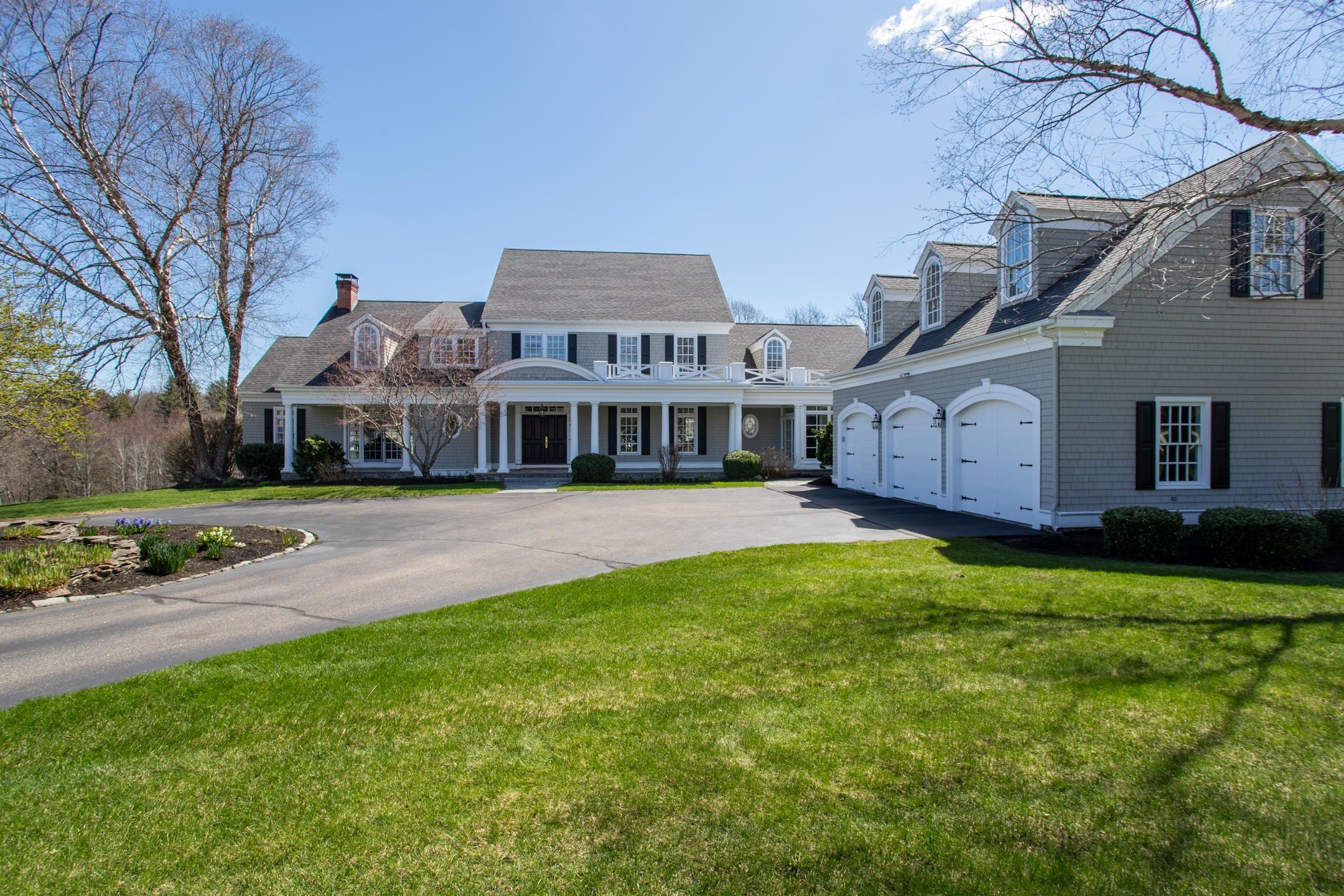 Image 2: Exterior Front Elevation with Covered Porches
