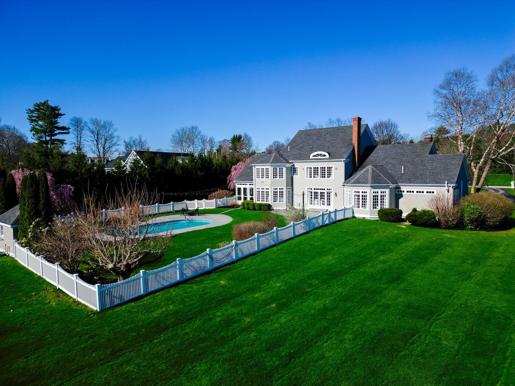 Image 4: Aerial Showing Fenced Pool Area and Sweeping Lawn
