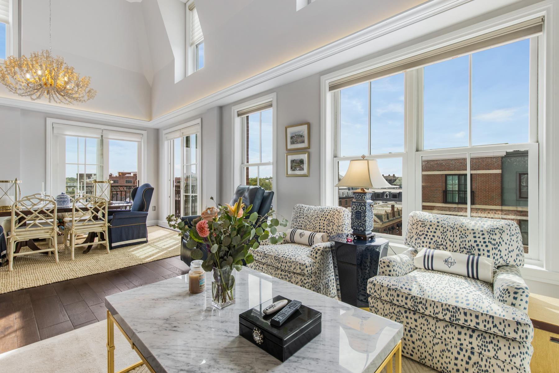 Image 3: Stunning Two-Story Ceilings in Dining and Living Rooms
