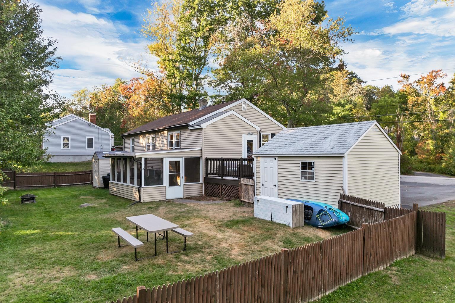 Image 1: fenced-in backyard