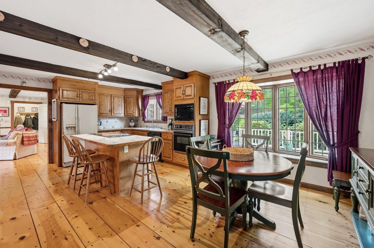 Image 3: Large eat-in kitchen with pegged wide pine floors and expose Image 3: Large eat-in kitchen with pegged wide pine floors and expose