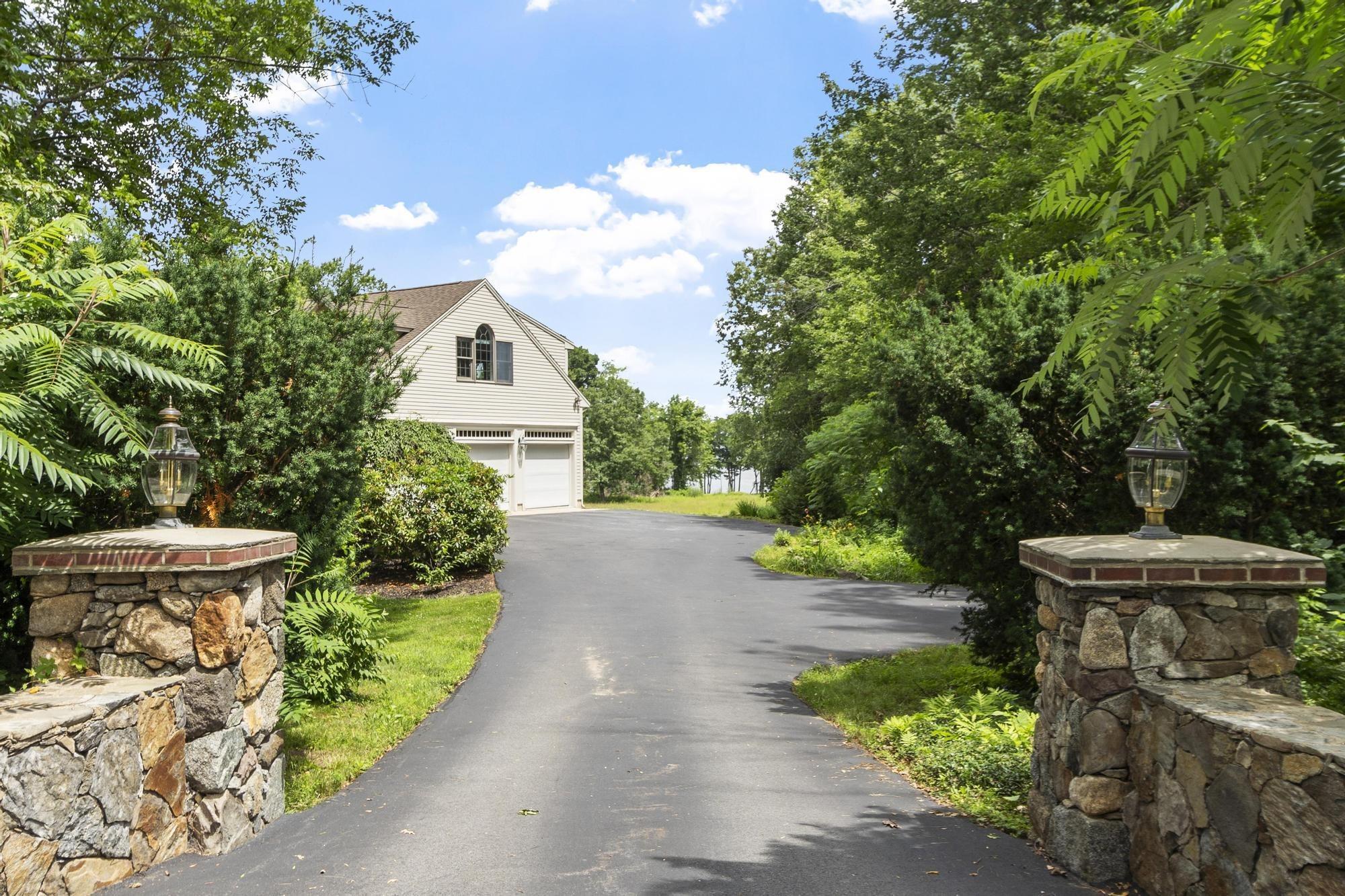 Image 3: columns flank driveway