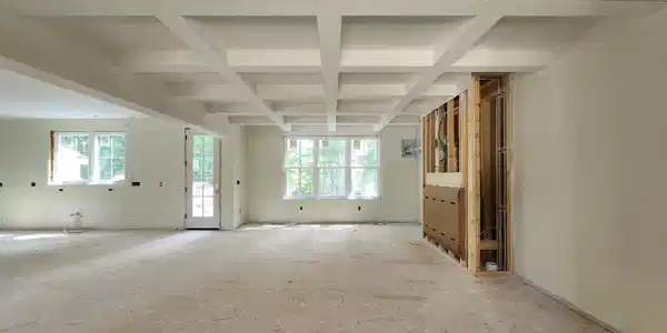 Image 4: Living room with coffered ceiling & oversized gas fireplace Image 4: Living room with coffered ceiling & oversized gas fireplace