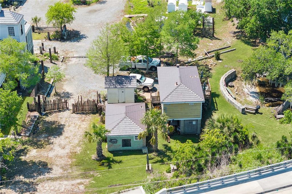 Image 4: 4518 Jean Lafitte Aerial View of Residence and Sto