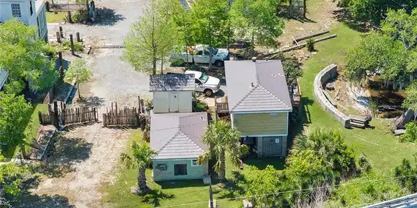 Image 4: 4518 Jean Lafitte Aerial View of Residence and Sto