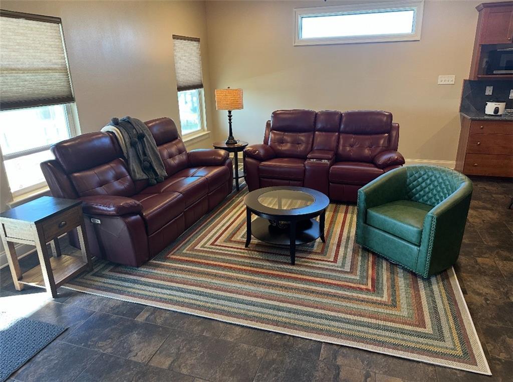 Image 2: Oversized den with fire place