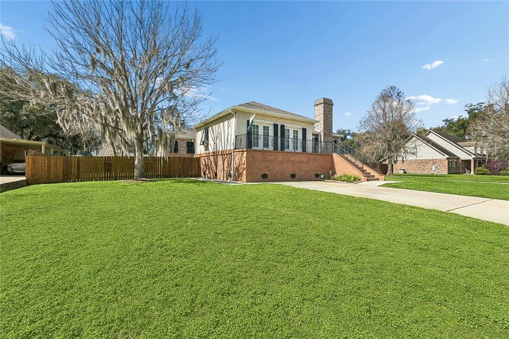 Image 3: Another view of front of the home