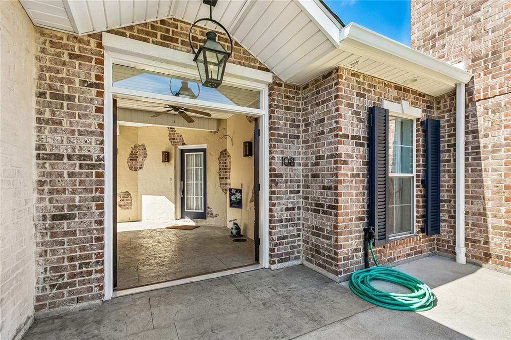 Image 4: Front of home showing area with front door in the
