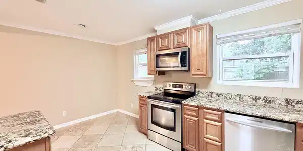 Image 3: Granite Countertops & Stainless Steel Appliances