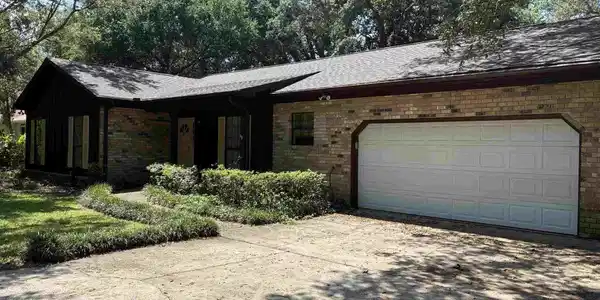 Image 2: 2 car garage front entrance with add. 2in the back