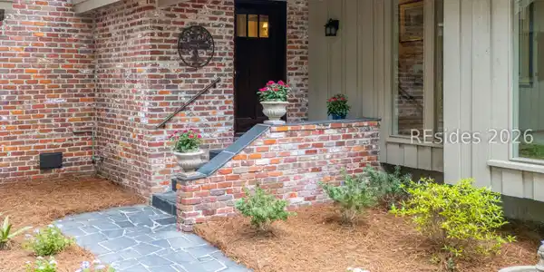 Image 4: Charming entry with brick accents Image 4: Charming entry with brick accents