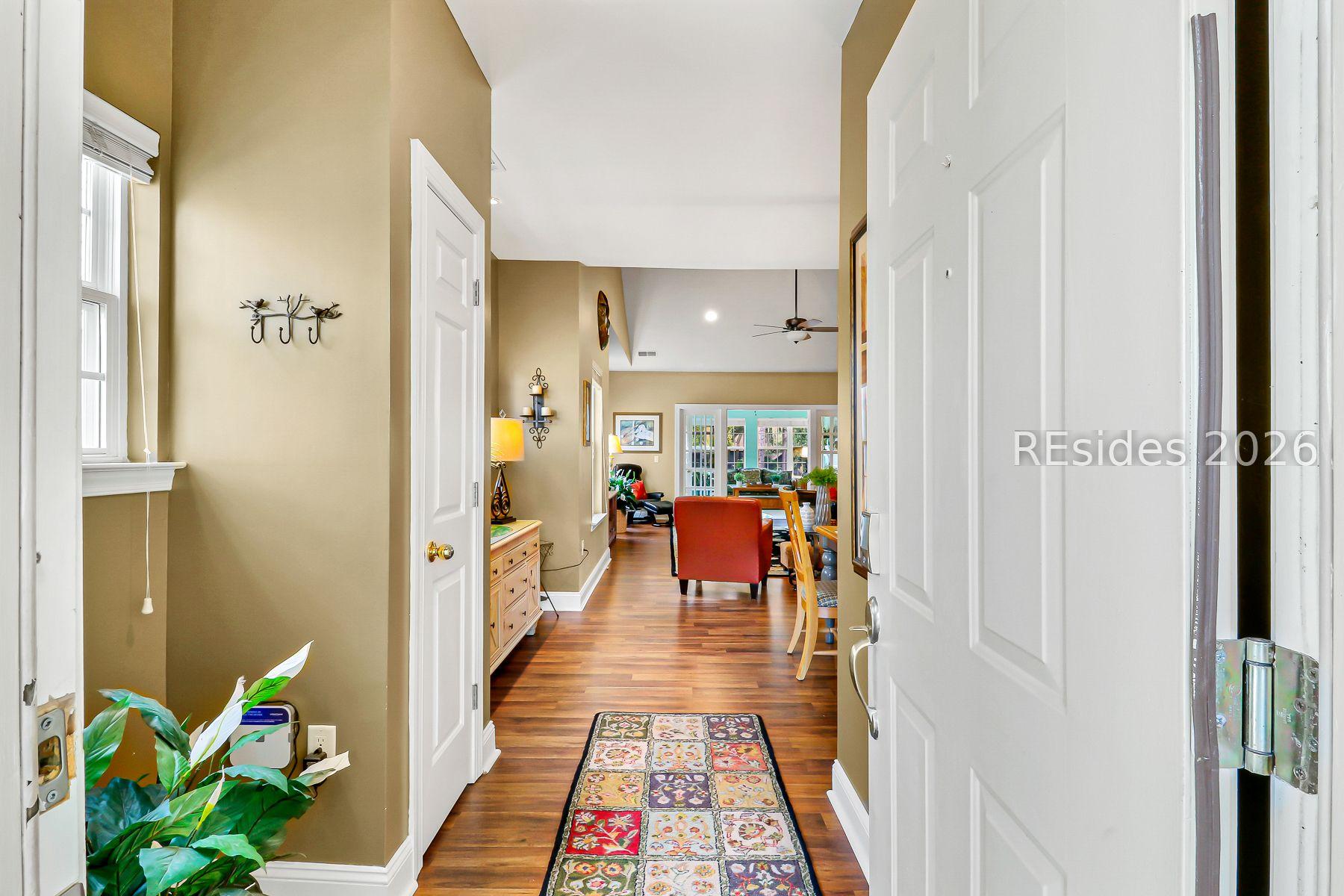 Image 3: Foyer entrance with entry closet