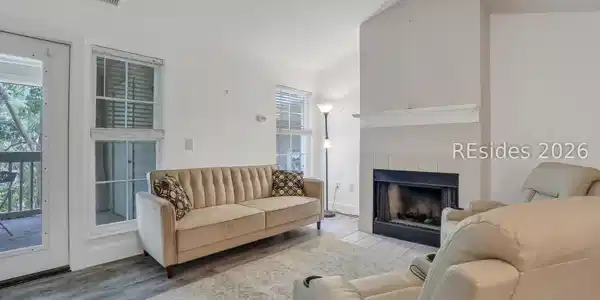 Image 4: Cozy Living Room with Fireplace Image 4: Cozy Living Room with Fireplace