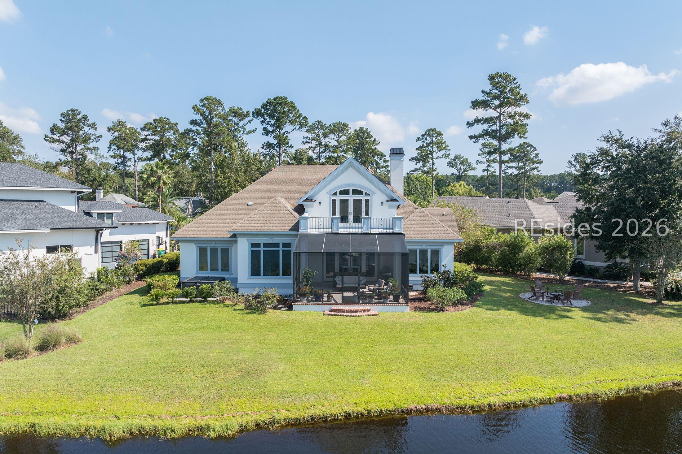Image 2: Large Backyard with Hot Tub and Screened-In Porch Image 2: Large Backyard with Hot Tub and Screened-In Porch