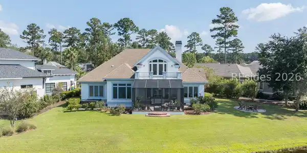 Image 2: Large Backyard with Hot Tub and Screened-In Porch Image 2: Large Backyard with Hot Tub and Screened-In Porch