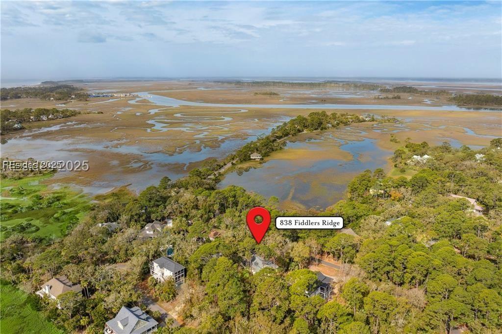 Image 4: Hightide water view in front of home beyond the be