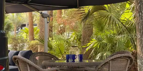 Image 4: Dinning table w/ 4 chairs under 2nd large umbrella Image 4: Dinning table w/ 4 chairs under 2nd large umbrella