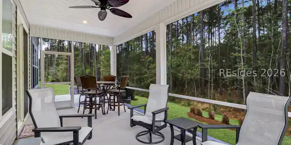 Image 3: Spacious Screened-in Back Porch