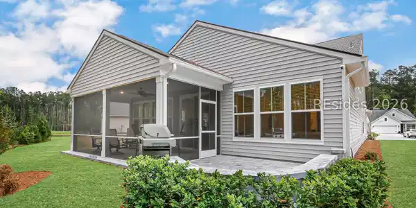 Image 4: View of Screened-in Porch & Paver Patio