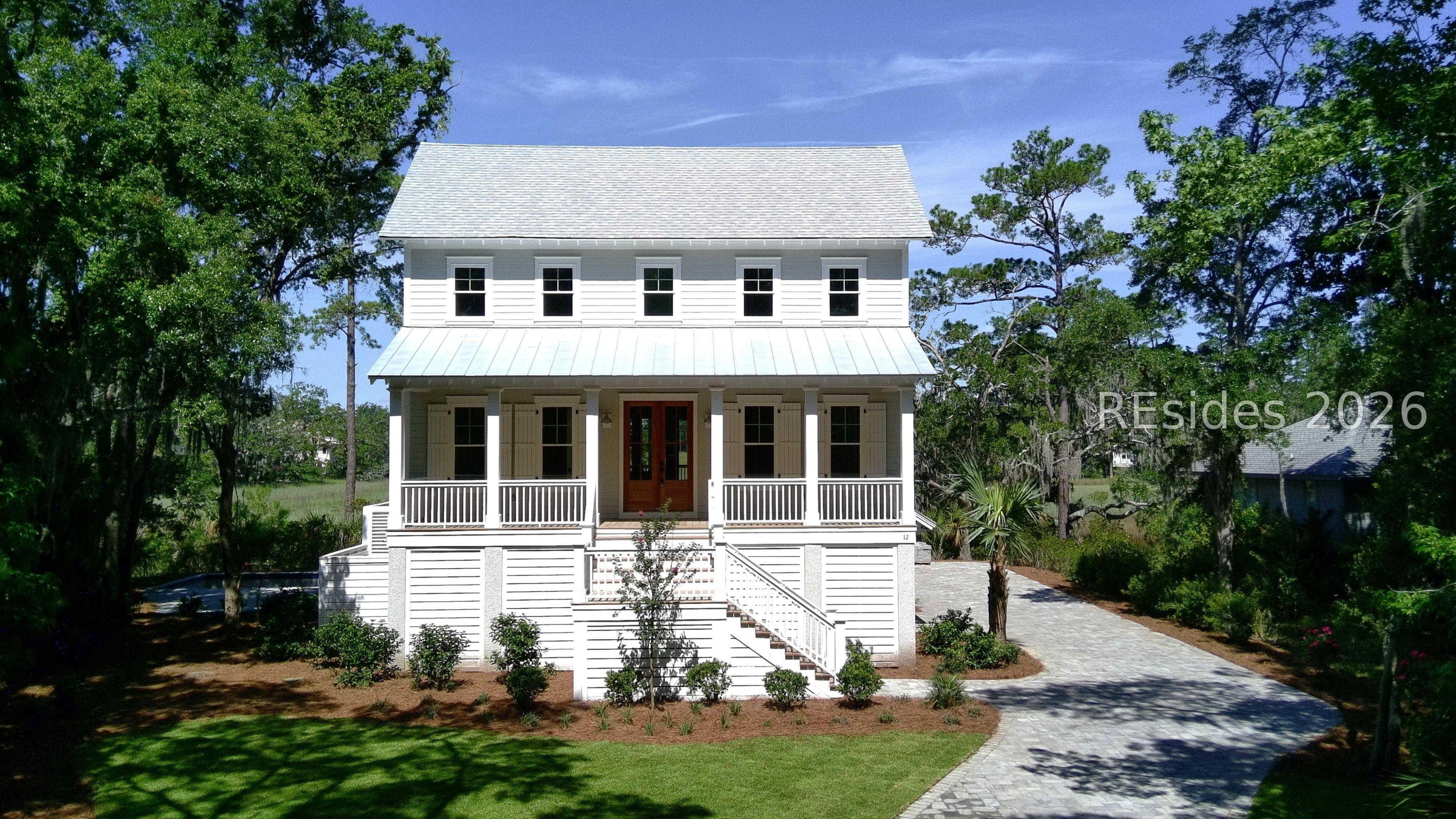 Image 3: Beautiful coastal style home w/ exposed rafters