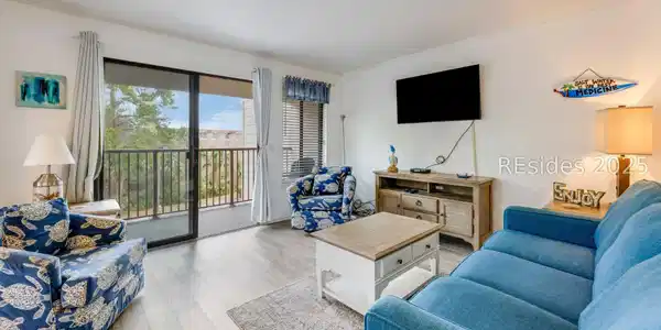 Image 2: Living room with new furniture opens to deck. Image 2: Living room with new furniture opens to deck.