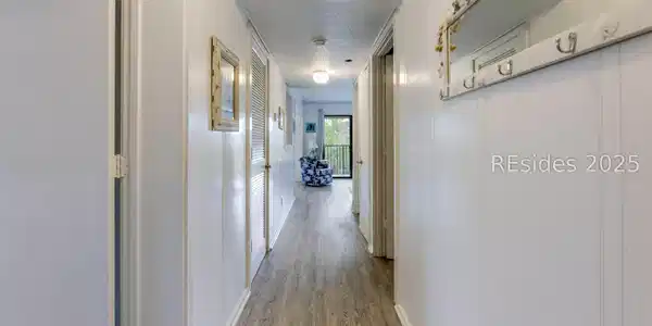 Image 3: New flooring throughout enhances entry hall. Image 3: New flooring throughout enhances entry hall.
