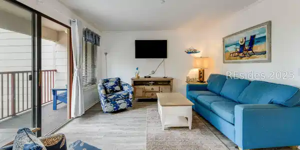 Image 4: Comfortable living room flows easily to deck. Image 4: Comfortable living room flows easily to deck.